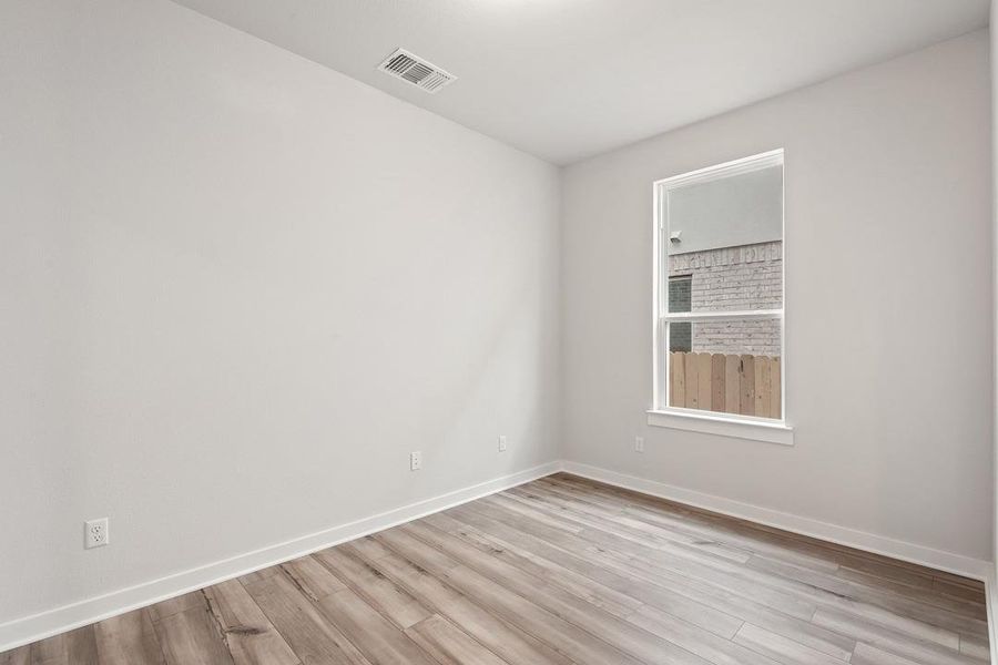 Spacious, unfurnished interior of a new home in Flora, Hutto (Image 17).