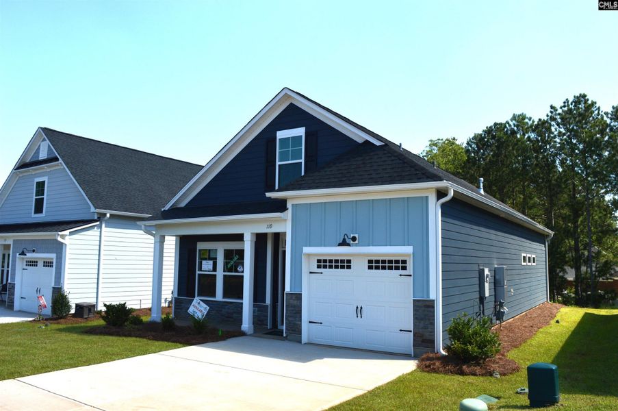 Front exterior of a new home in Bickley Station, Irmo, SC, highlighting curb appeal (Image 2).
