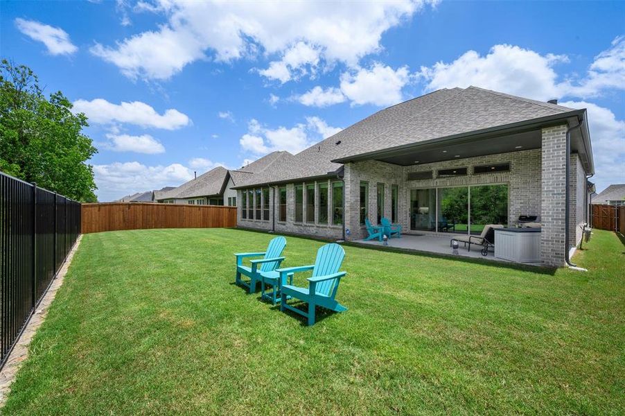 Exterior details and patio area of a home in Sonoma Verde, McLendon-Chisholm (Image 4).