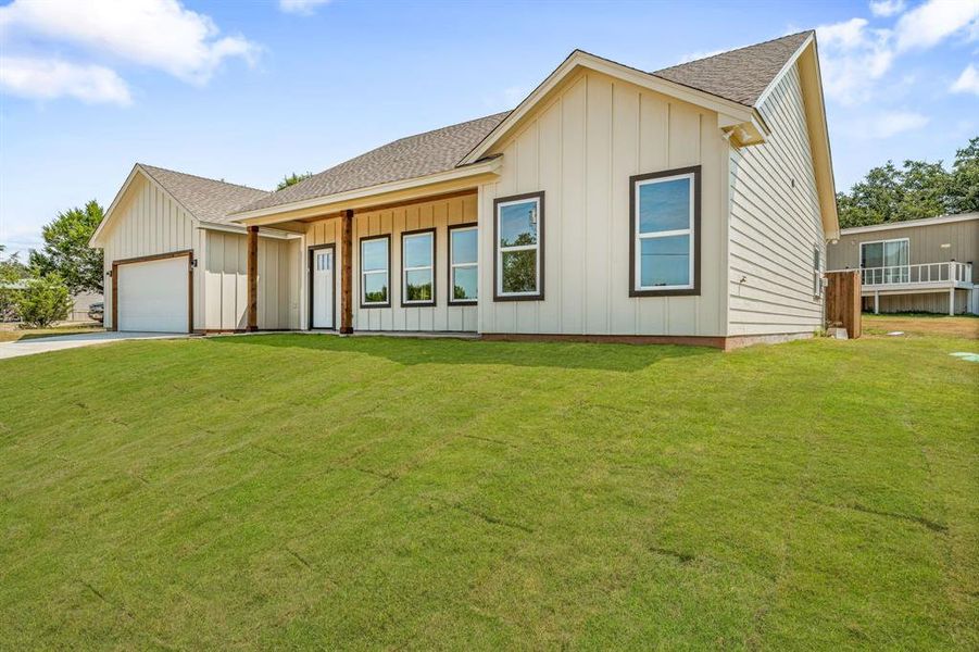 Front exterior of a new home in , Granbury, TX, highlighting curb appeal (Image 2). Front exterior of a new home in , Granbury, TX, highlighting curb appeal (Image 2).