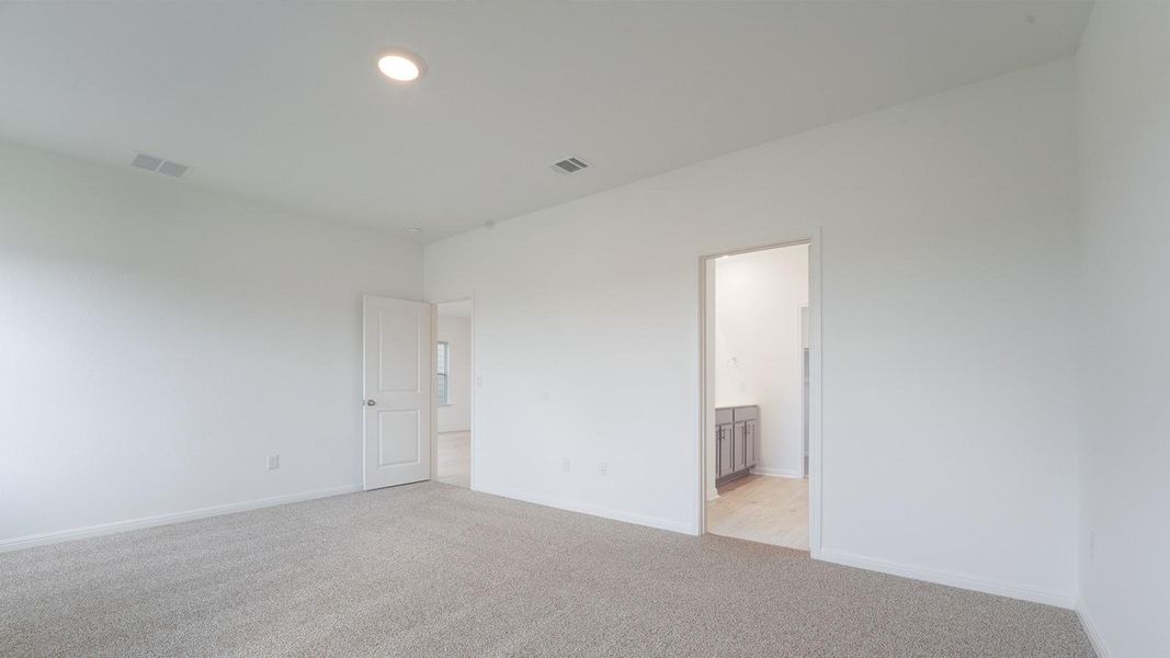 Spacious, unfurnished interior of a new home in Prairie Lakes, Buda (Image 24).