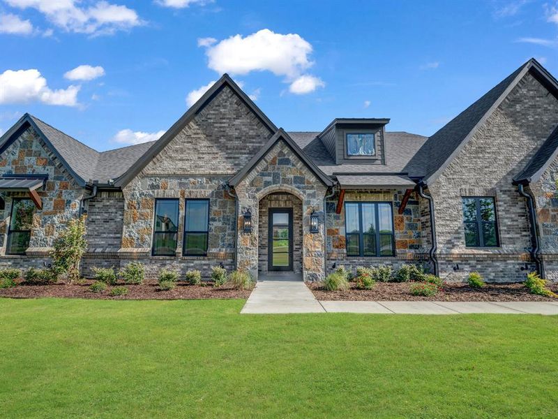 Front exterior of a new home in , Weatherford, TX, highlighting curb appeal (Image 27).