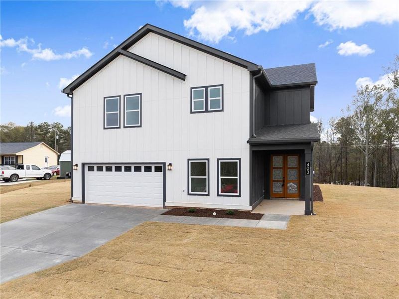 Front exterior of a new home in , Jefferson, GA, highlighting curb appeal (Image 2).