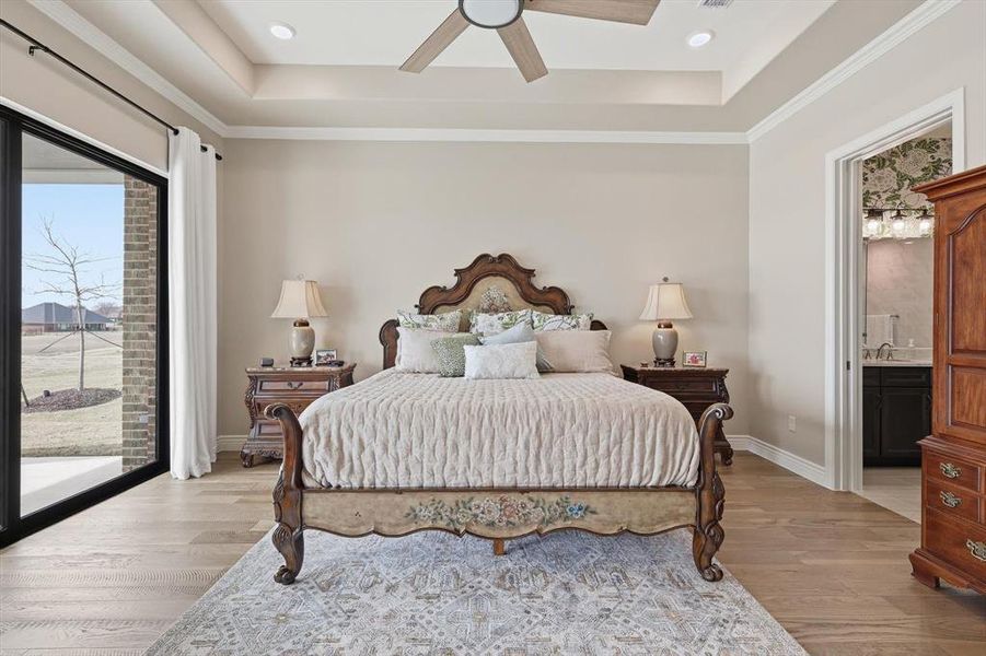 The Primary Suite is a Magnificent Private Sanctuary positioned to Capture Sweeping Fairway Views with a Dramatic Wall of Three-Panel Sliding Glass that opens to the Outdoor Pavilion. Grand in Scale yet Serene in Ambiance, this Luxurious Retreat offers a True Sense of Escape within the Home and Enjoys a Luxurious En-Suite Bath.