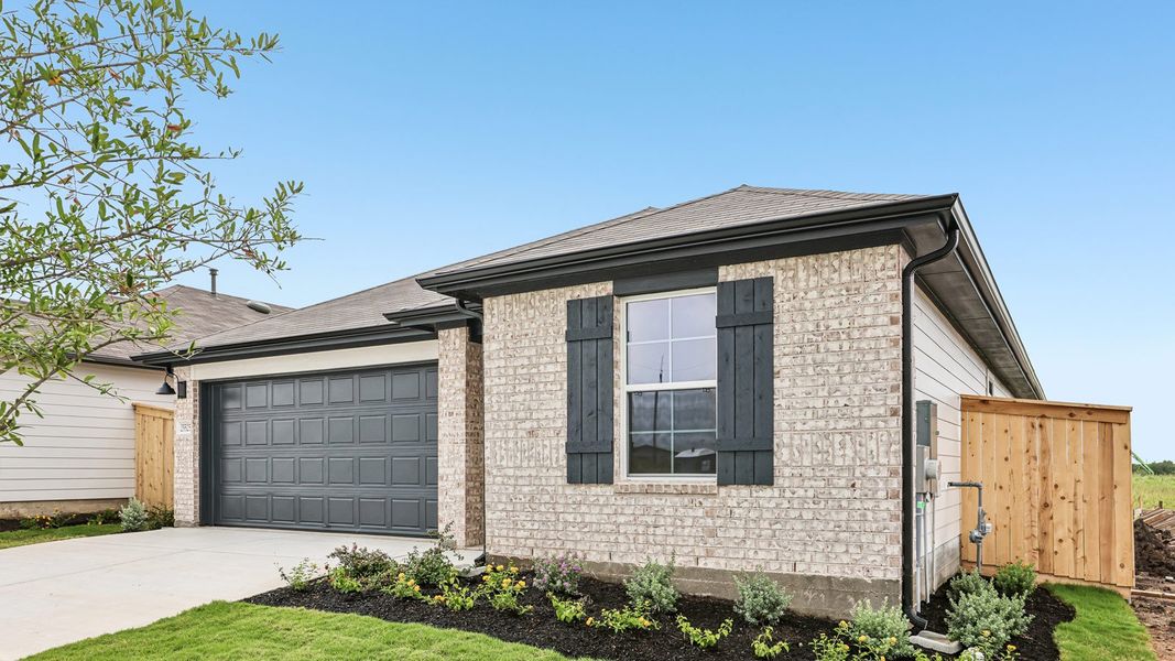 Front exterior of a new home in Briarwood, Elgin, TX, highlighting curb appeal (Image 20).