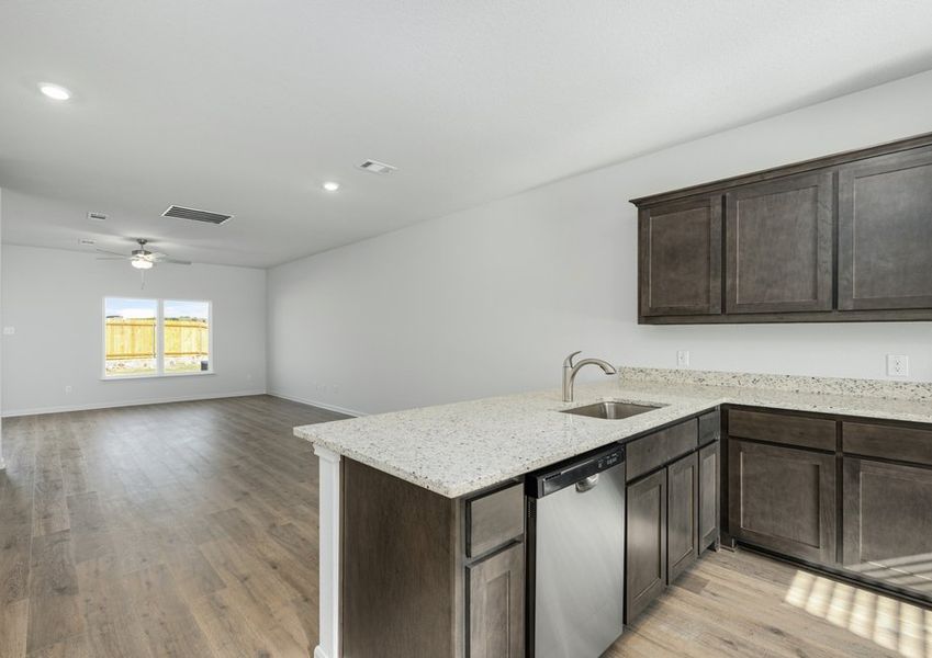 The kitchen of the Driftwood looks out into the dining room.