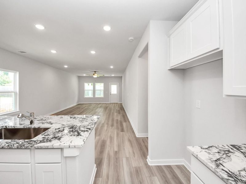 Furnished interior view inside a new home in Windmill Estates, Magnolia (Image 6).