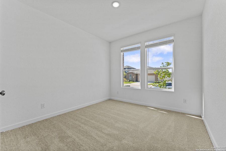 Spacious, unfurnished interior of a new home in Waterwheel: Coastline Collection, San Antonio (Image 16).