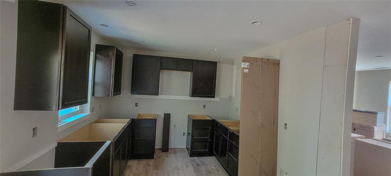 Kitchen featuring light hardwood / wood-style floors