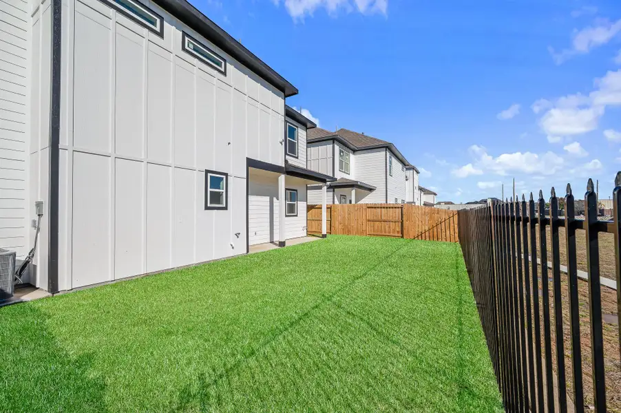 Exterior details and patio area of a home in Metro Village, Houston (Image 27). Exterior details and patio area of a home in Metro Village, Houston (Image 27).
