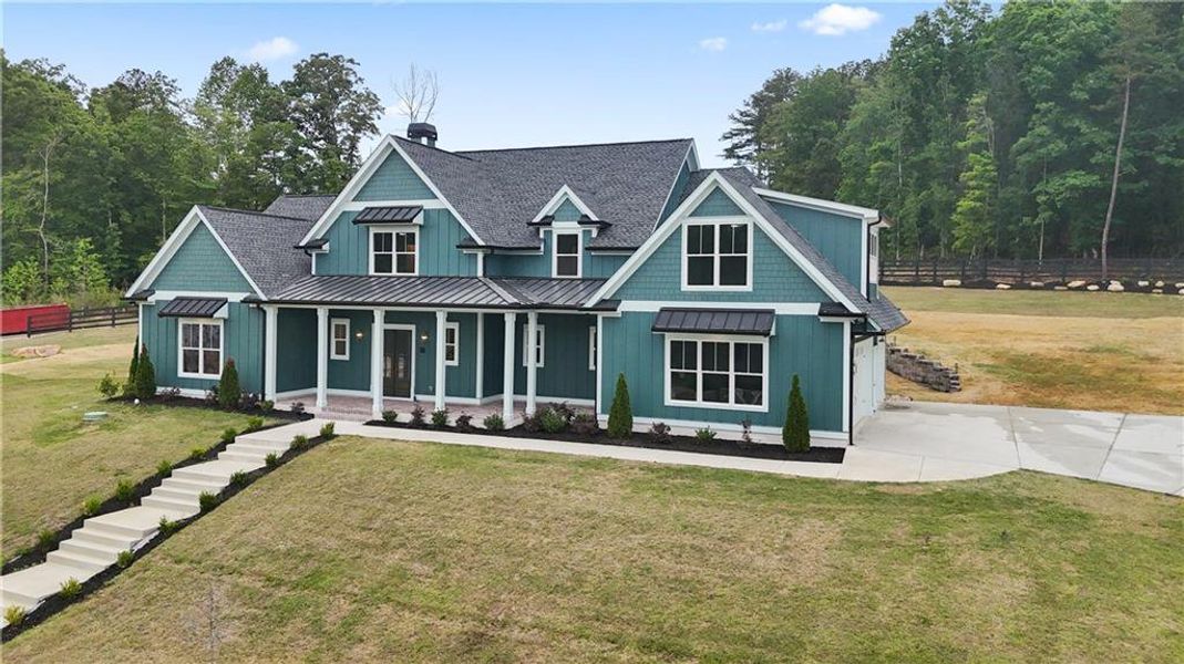 Front exterior of a new home in , Dacula, GA, highlighting curb appeal (Image 27).