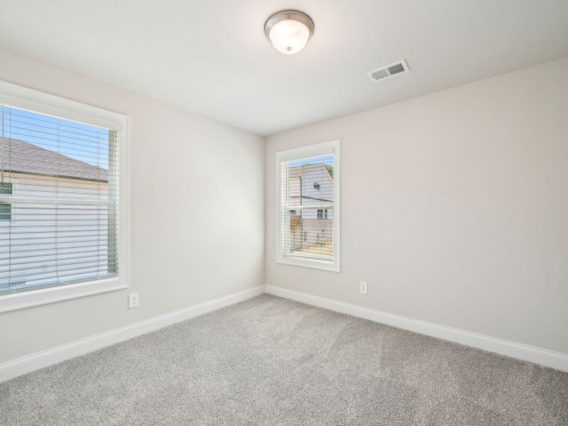 Secondary Bedroom in the Oleander floorplan at a Meritage Homes community in Atlanta, GA.