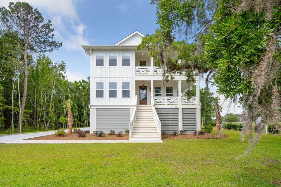 Front exterior of a new home in Miller's Crossing, Johns Island, SC, highlighting curb appeal (Image 1).