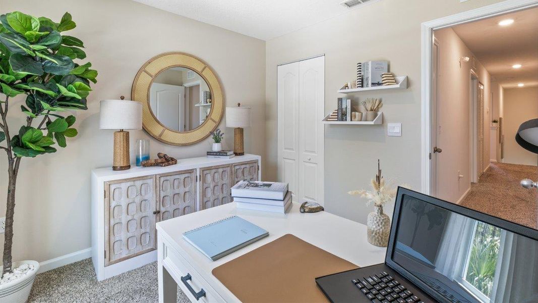 Representative furnished interior of a home built from the GREYSON by D.R. Horton in Hansen Creek, Jacksonville (Image 17).