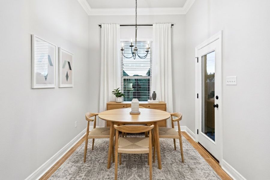 Front exterior of a new home in Starburst at Hammock Bay, Freeport, FL, highlighting curb appeal (Image 16).