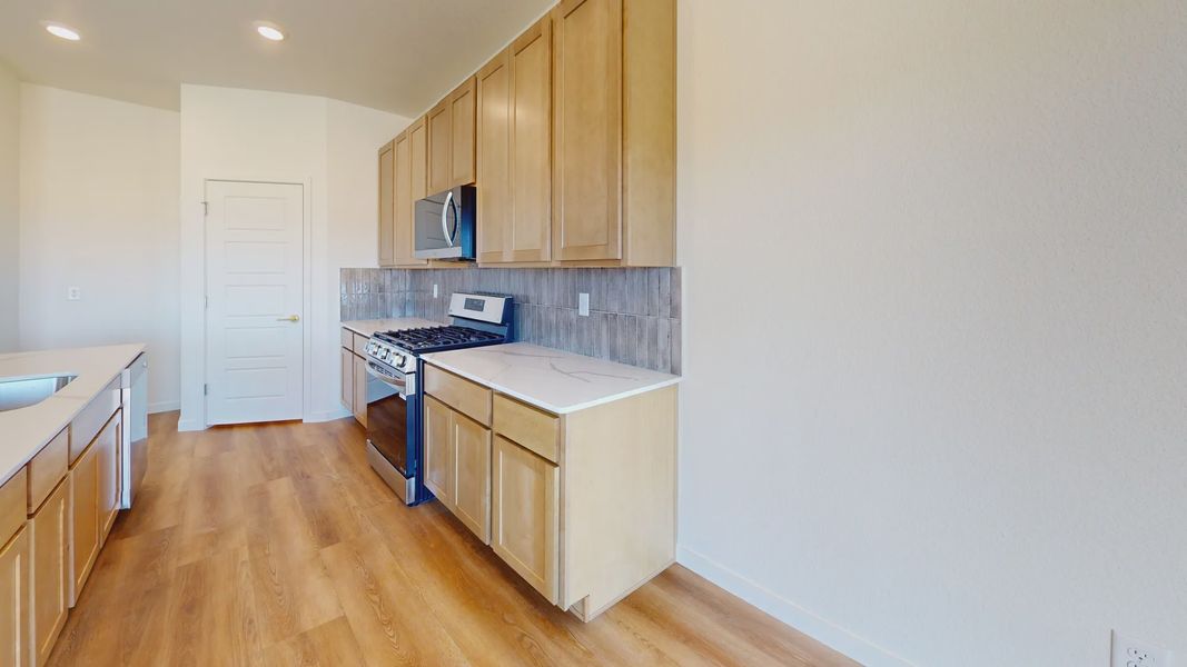 Furnished interior view inside a new home in Hudson Hills, Hudson (Image 5).