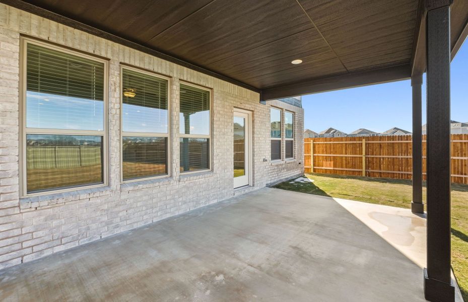 Exterior details and patio area of a home in Santa Rita Ranch, Liberty Hill (Image 20).