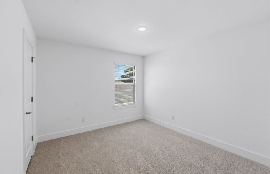 Spacious, unfurnished interior of a new home in Saddleback at Santa Rita Ranch, Liberty Hill (Image 31).