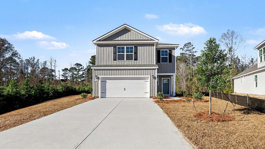 Representative exterior photo of a completed home built from the Manning by D.R. Horton in Pinewood Estates, Conway, SC (Image 4).