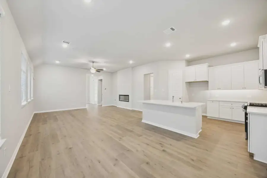 Representative unfurnished interior of a home built from the Sacramento by Chesmar Homes in Summer Crest, Crowley (Image 10).