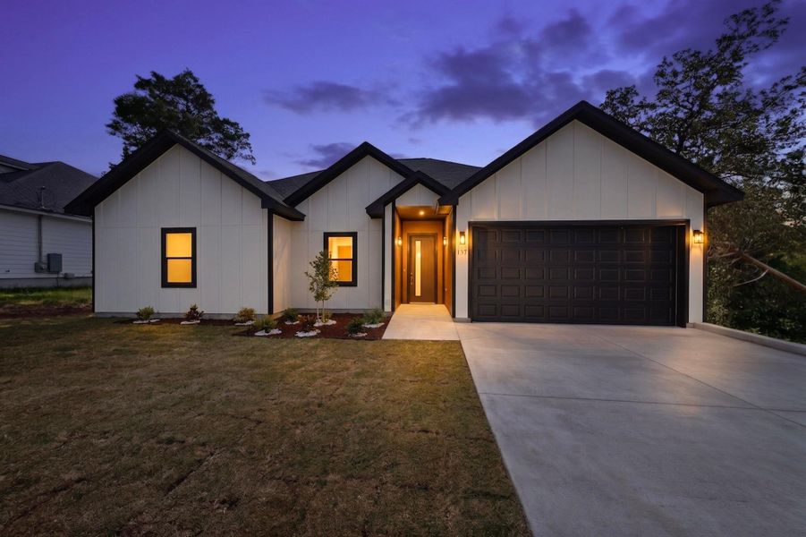 Clean lines and a striking modern facade define this appealing new construction.