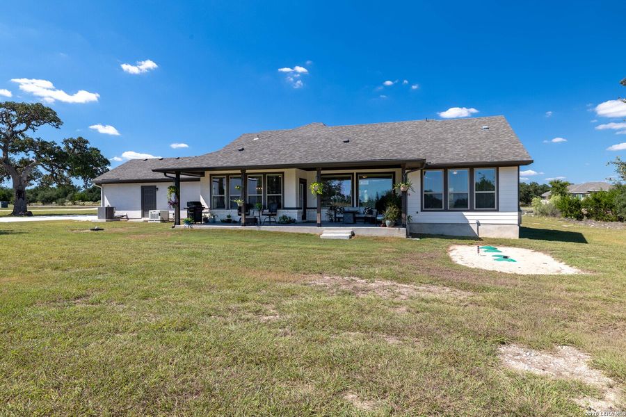 Exterior details and patio area of a home in , Bandera (Image 3).