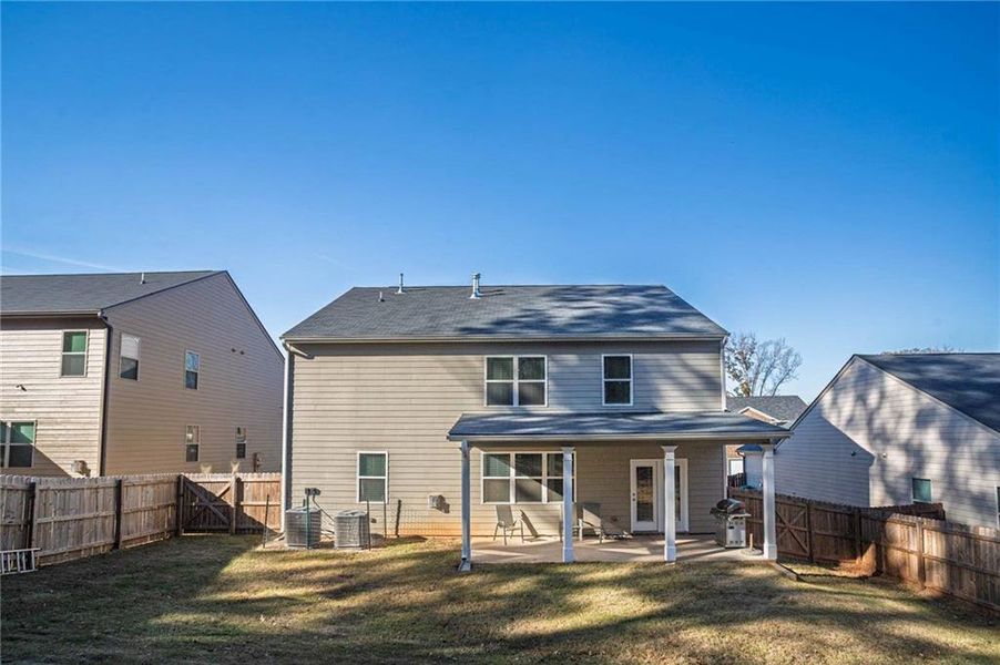 Exterior details and patio area of a home in , Stonecrest (Image 28).