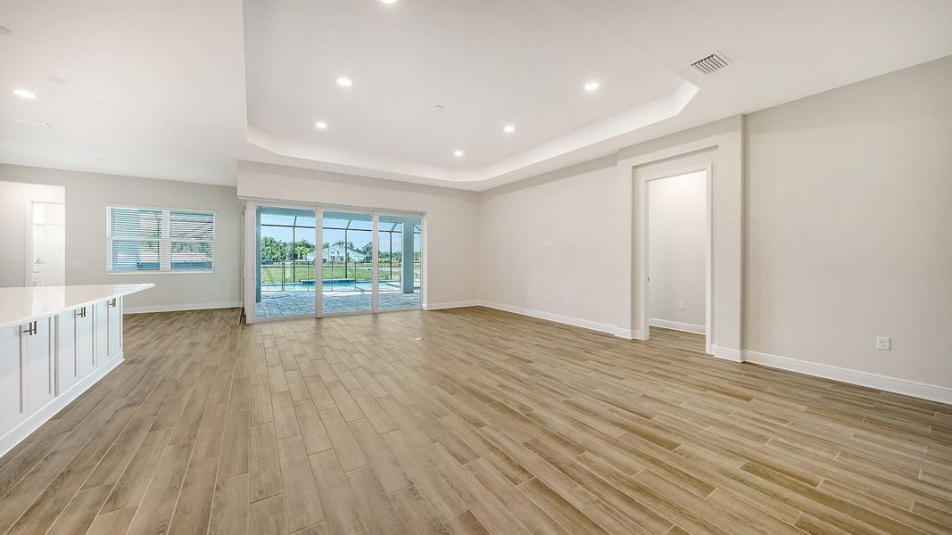Spacious, unfurnished interior of a new home in Canoe Creek Real Estate and Homes for Sale in Parrish, FL - Neal Communities, Parrish (Image 22).