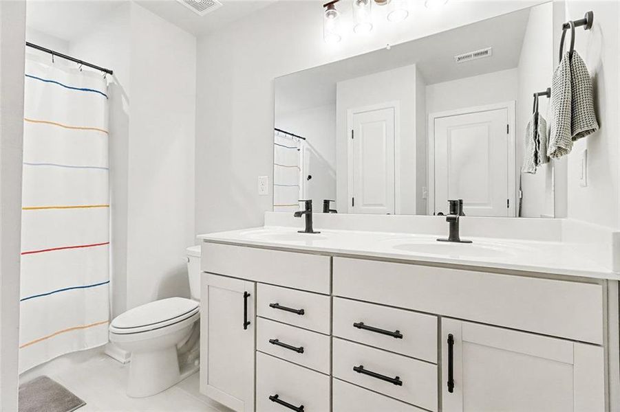 Furnished interior view inside a new home in Pinebrook at Hamilton Mill, Auburn (Image 8). Furnished interior view inside a new home in Pinebrook at Hamilton Mill, Auburn (Image 8).