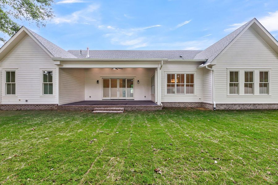 Front exterior of a new home in , Johns Island, SC, highlighting curb appeal (Image 1). Front exterior of a new home in , Johns Island, SC, highlighting curb appeal (Image 1).