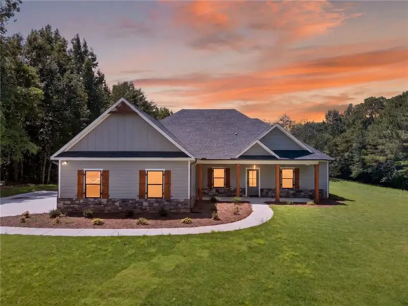 Front exterior of a new home in , Waco, GA, highlighting curb appeal (Image 20).
