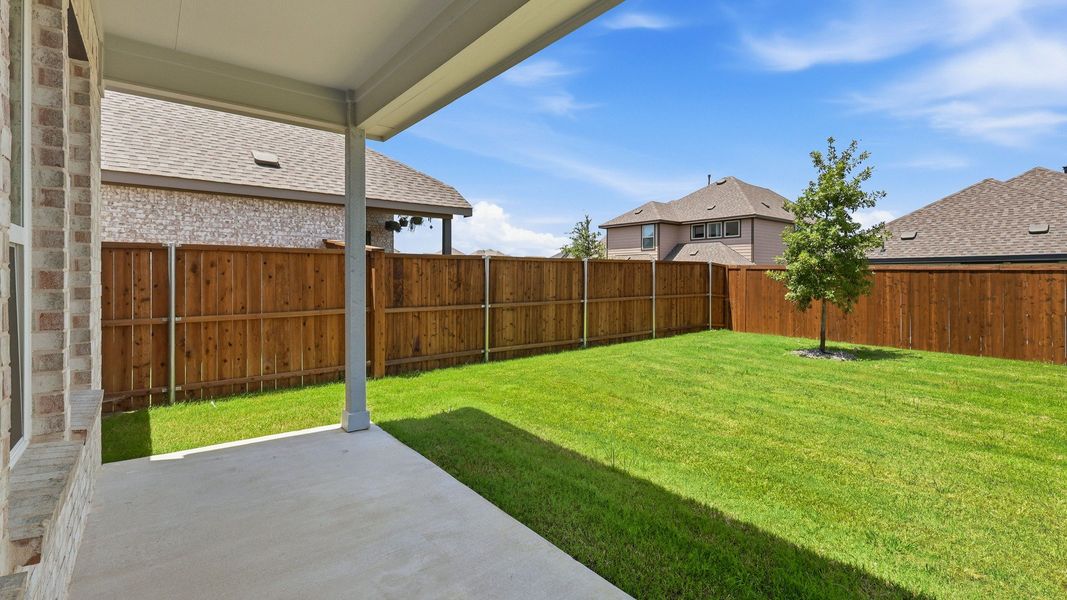 Exterior details and patio area of a home in Anna Ranch, Anna (Image 4).