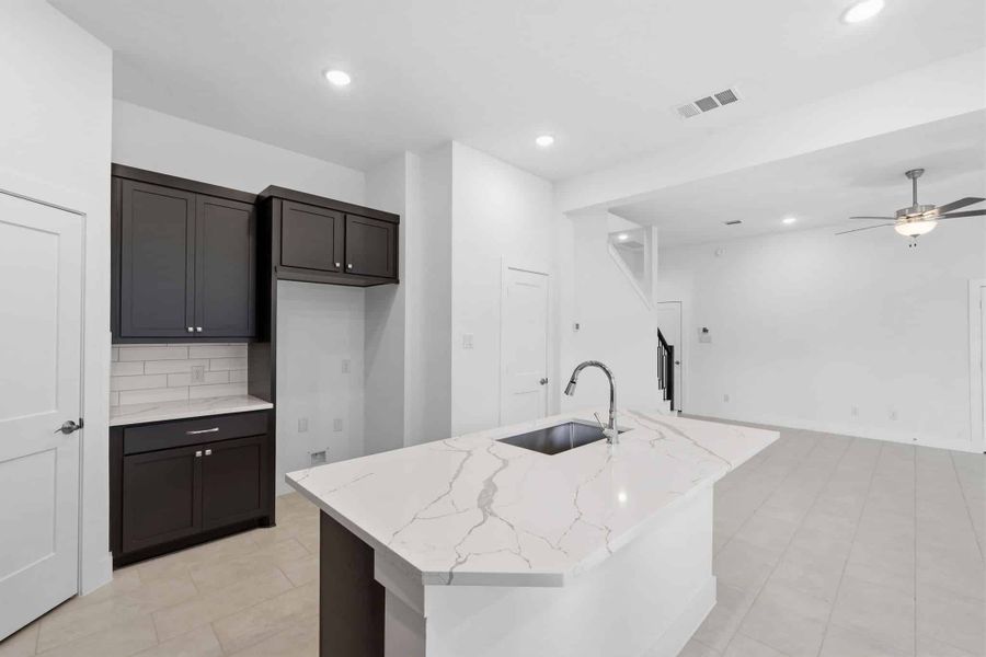 Furnished interior view inside a new home in Bridgeland, Cypress (Image 10).