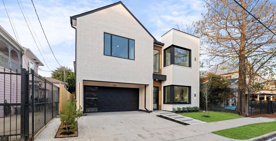 Front exterior of a new home in , Houston, TX, highlighting curb appeal (Image 24).