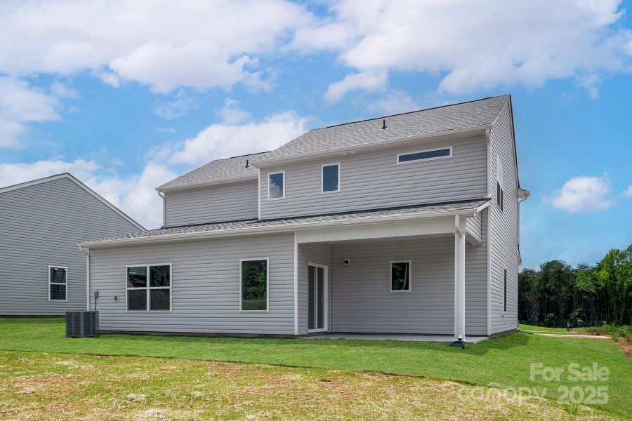 Exterior details and patio area of a home in Ascot Woods, Charlotte (Image 2).