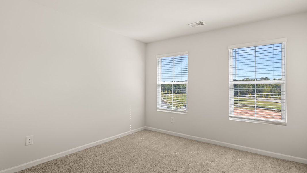 Spacious, unfurnished interior of a new home in Brookland Commons, Monroe (Image 26).