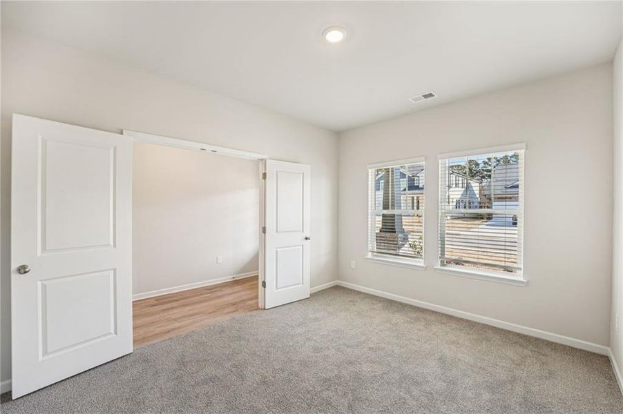 Spacious, unfurnished interior of a new home in Westmont Preserve, Powder Springs (Image 40).