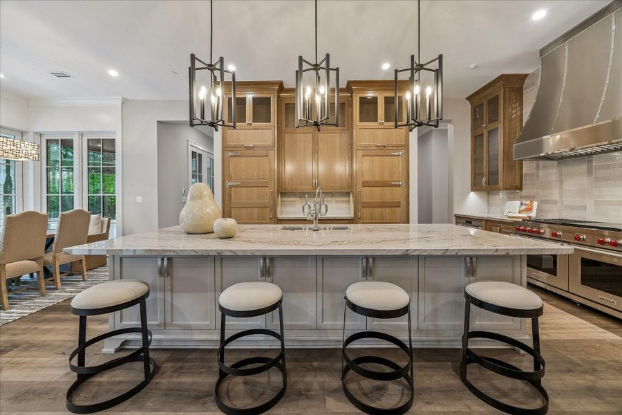 CHEF'S KITCHEN WITH LARGE EAT-IN ISLAND