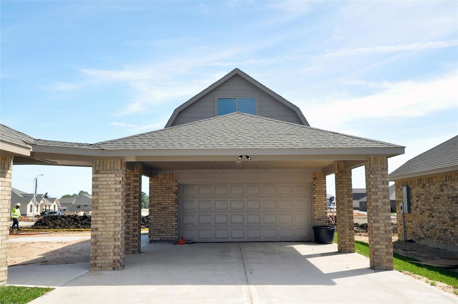 Front exterior of a new home in , League City, TX, highlighting curb appeal (Image 19).