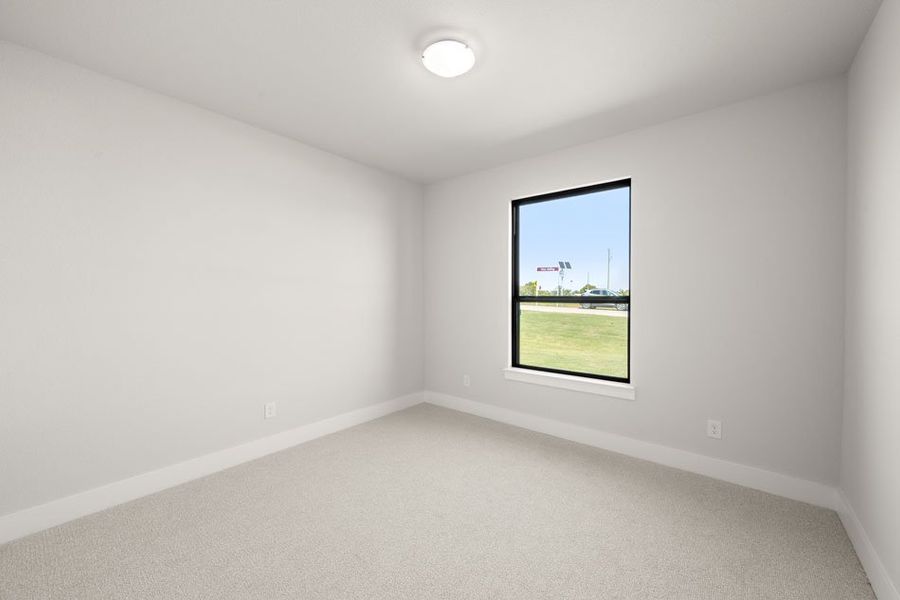 Front exterior of a new home in Carrera Ranch, Waxahachie, TX, highlighting curb appeal (Image 22).