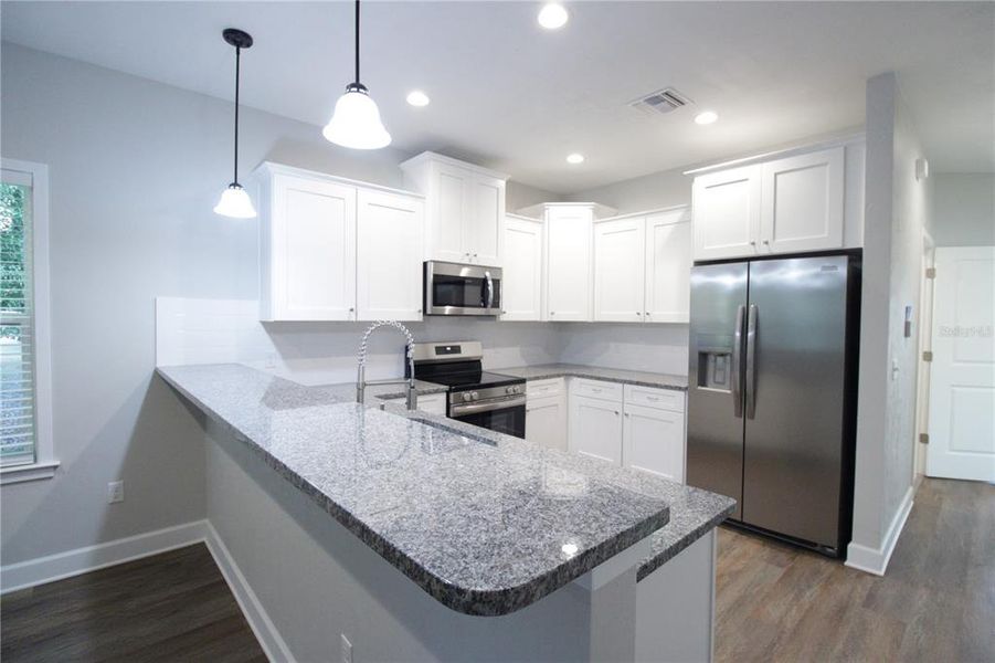 Furnished interior view inside a new home in , Lake City (Image 4). Furnished interior view inside a new home in , Lake City (Image 4).