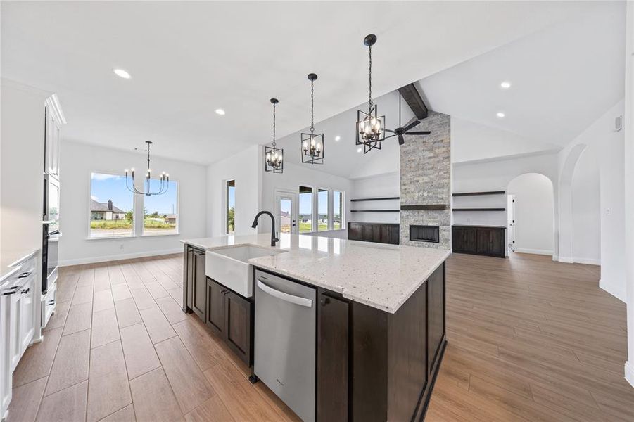Kitchen featuring stainless steel appliances, a chandelier, plenty of natural light, and recessed lighting