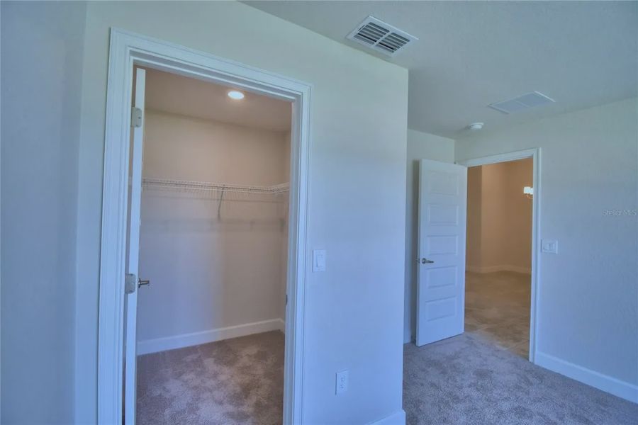 Spacious, unfurnished interior of a new home in Cadence Crossing, Auburndale (Image 25).
