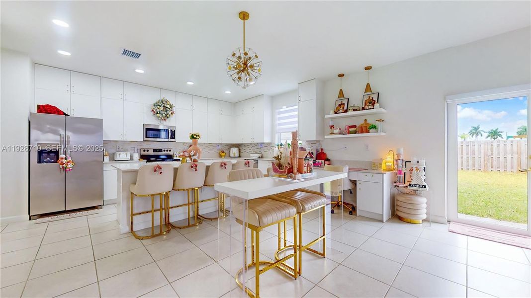 Furnished interior view inside a new home in , Homestead (Image 8). Furnished interior view inside a new home in , Homestead (Image 8).