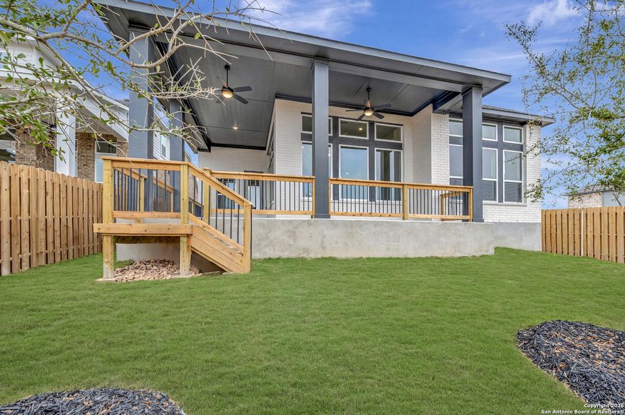 Exterior details and patio area of a home in Windsong - Reserve Series, Boerne (Image 3).