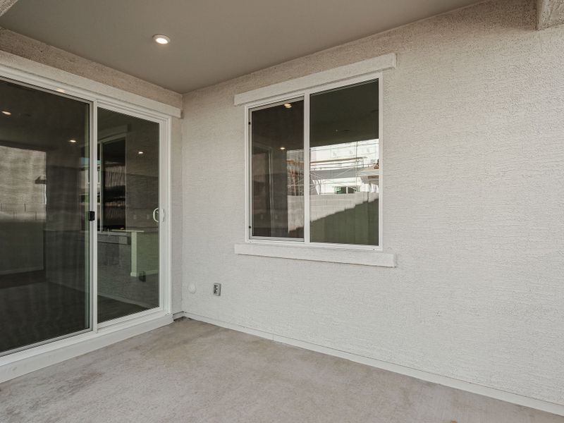 A room with a window and a door. A room with a window and a door.