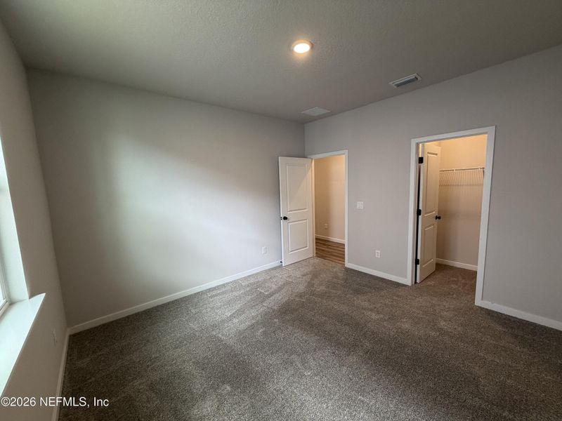 Spacious, unfurnished interior of a new home in Reserve East, Flagler Beach (Image 48).