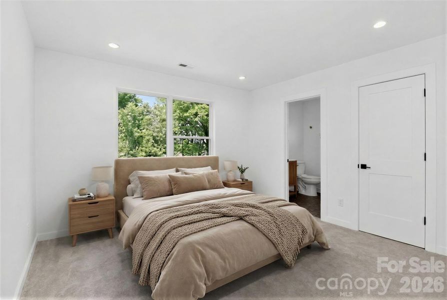 Main floor bedroom suite virtually staged.