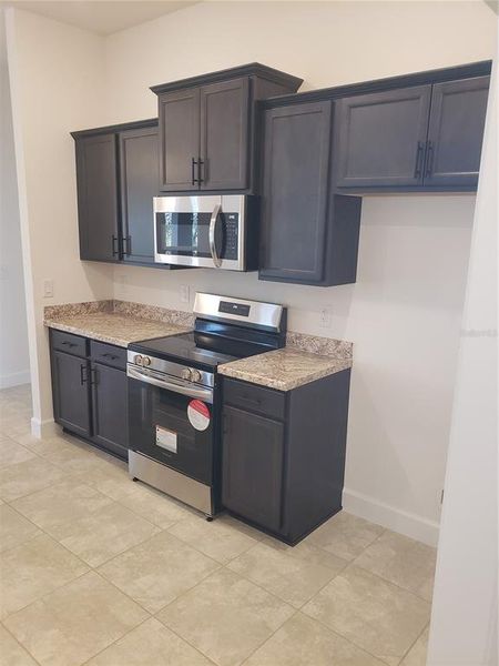 Furnished interior view inside a new home in Spring Hill, Spring Hill (Image 5).