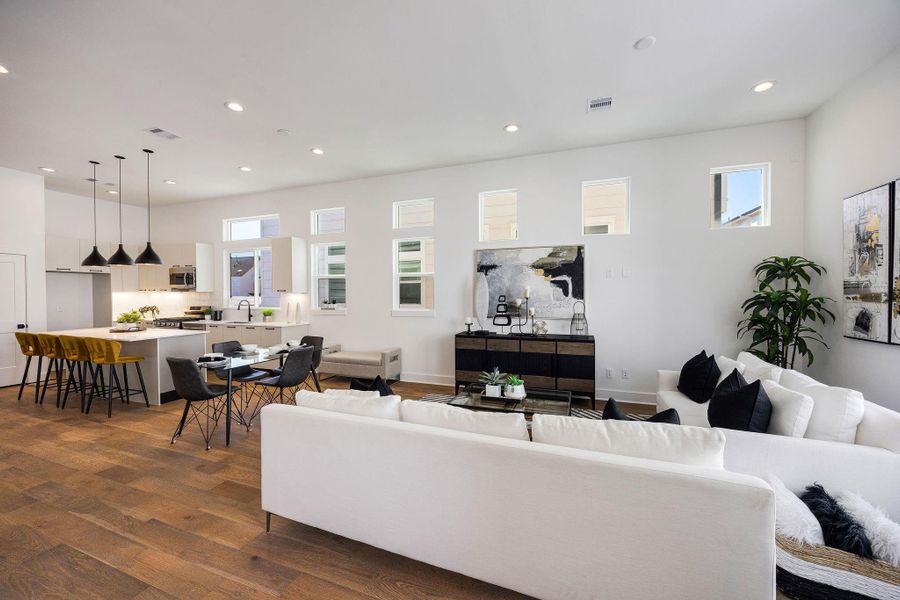 Elegant dining area seamlessly connected to a modern kitchen, perfect for entertaining and family gatherings.